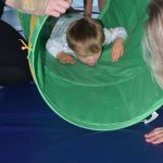 Boy during respite care in green tunnel
